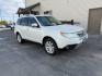 2012 Satin White Pearl /Black Leather Interior Subaru Forester 2.5X Touring (JF2SHAGC0CH) with an 2.5L H4 SOHC 16V engine, 4-Speed Automatic transmission, located at 1235 N Woodruff Ave., Idaho Falls, 83401, (208) 523-1053, 43.507172, -112.000488 - Photo#5