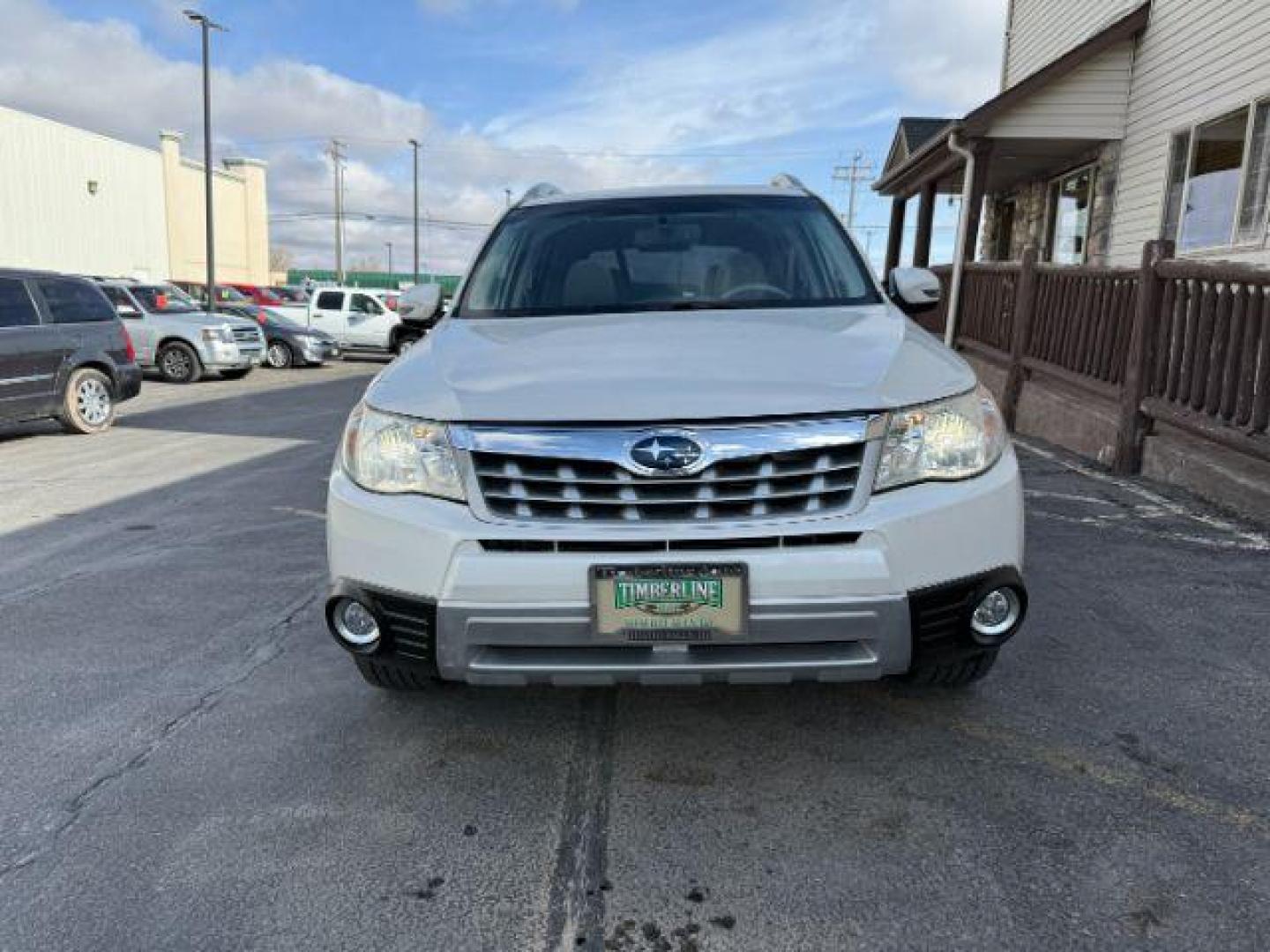 2012 Satin White Pearl /Black Leather Interior Subaru Forester 2.5X Touring (JF2SHAGC0CH) with an 2.5L H4 SOHC 16V engine, 4-Speed Automatic transmission, located at 1235 N Woodruff Ave., Idaho Falls, 83401, (208) 523-1053, 43.507172, -112.000488 - Photo#6