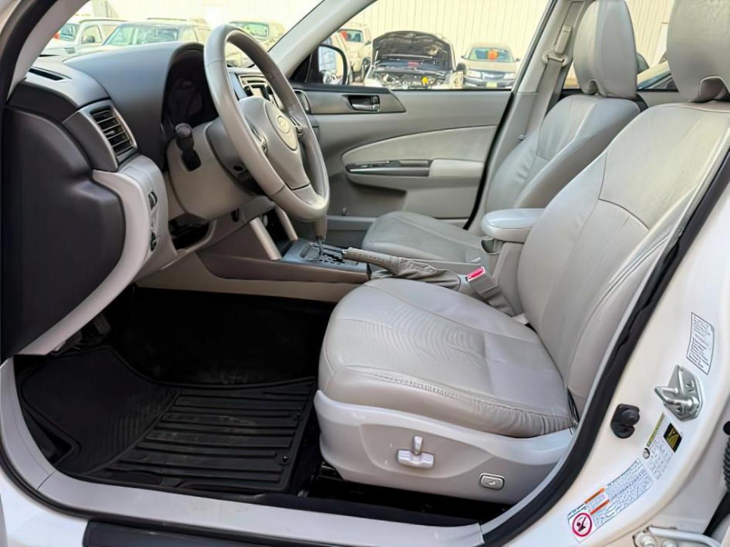 2012 Satin White Pearl /Black Leather Interior Subaru Forester (JF2SHAGC0CH) with an 25L H4 SOHC 16V engine, Automatic transmission, located at 1175 N Woodruff Ave, Idaho Falls, ID, 83401, 43.506901, -111.999657 - At Timberline Auto, finding a great deal on your next vehicle is always easy! Our experienced sales staff's goal is to help find you the right vehicle at the right price! Our knowledgeable finance department has options for almost any credit score. We offer extended service contract options to prote - Photo#8