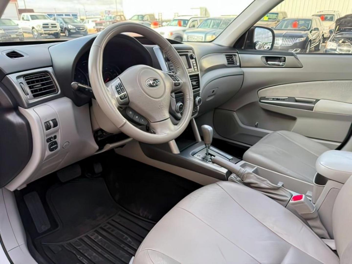 2012 Satin White Pearl /Black Leather Interior Subaru Forester (JF2SHAGC0CH) with an 25L H4 SOHC 16V engine, Automatic transmission, located at 1175 N Woodruff Ave, Idaho Falls, ID, 83401, 43.506901, -111.999657 - At Timberline Auto, finding a great deal on your next vehicle is always easy! Our experienced sales staff's goal is to help find you the right vehicle at the right price! Our knowledgeable finance department has options for almost any credit score. We offer extended service contract options to prote - Photo#9
