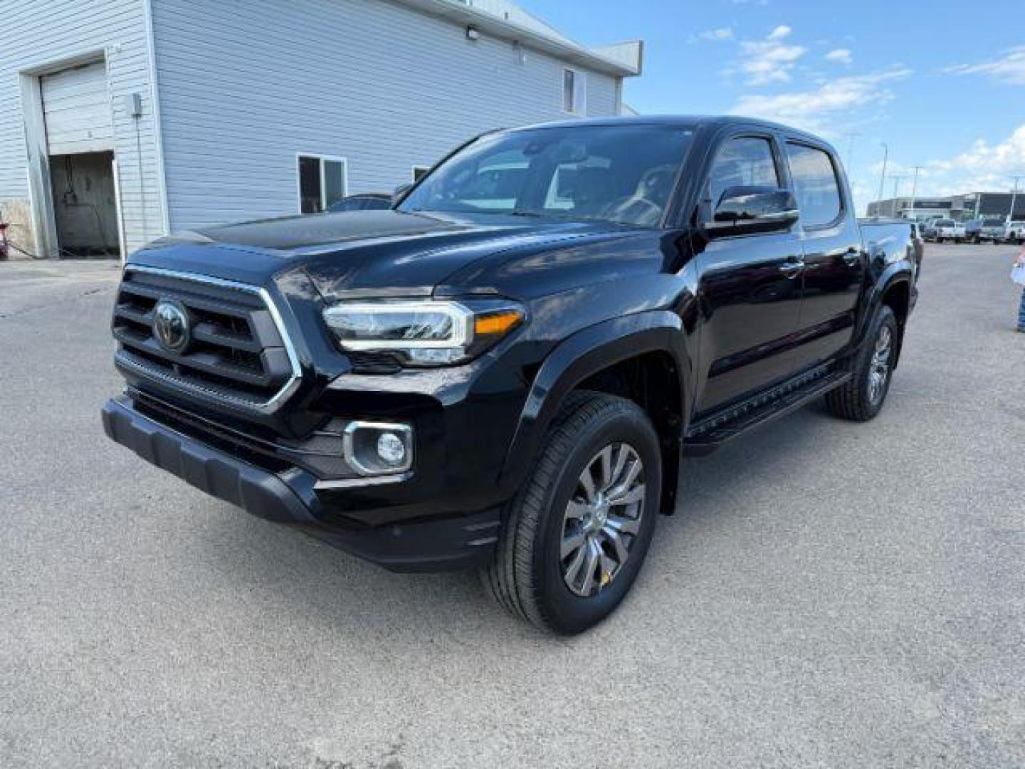 2022 Midnight Black Metallic /Black/Black Toyota Tacoma Limited (3TYGZ5AN0NT) with an 3.5L V-6 port/direct injection engine, AUTOMATIC transmission, located at 1235 N Woodruff Ave., Idaho Falls, 83401, (208) 523-1053, 43.507172, -112.000488 - At Timberline Auto, finding a great deal on your next vehicle is always easy! Our experienced sales staff's goal is to help find you the right vehicle at the right price! Our knowledgeable finance department has options for almost any credit score. We offer extended service contract options to prote - Photo#0