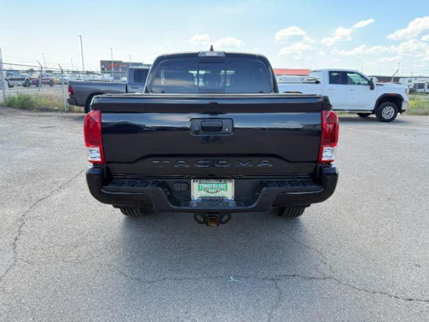 2022 Midnight Black Metallic /Black/Black Toyota Tacoma Limited (3TYGZ5AN0NT) with an 3.5L V-6 port/direct injection engine, AUTOMATIC transmission, located at 1235 N Woodruff Ave., Idaho Falls, 83401, (208) 523-1053, 43.507172, -112.000488 - At Timberline Auto, finding a great deal on your next vehicle is always easy! Our experienced sales staff's goal is to help find you the right vehicle at the right price! Our knowledgeable finance department has options for almost any credit score. We offer extended service contract options to prote - Photo#3