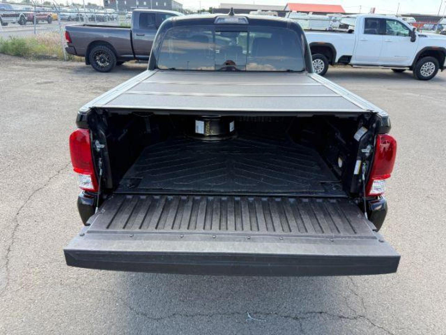 2022 Midnight Black Metallic /Black/Black Toyota Tacoma Limited (3TYGZ5AN0NT) with an 3.5L V-6 port/direct injection engine, AUTOMATIC transmission, located at 1235 N Woodruff Ave., Idaho Falls, 83401, (208) 523-1053, 43.507172, -112.000488 - At Timberline Auto, finding a great deal on your next vehicle is always easy! Our experienced sales staff's goal is to help find you the right vehicle at the right price! Our knowledgeable finance department has options for almost any credit score. We offer extended service contract options to prote - Photo#4