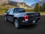 2022 Midnight Black Metallic /Black/Black Toyota Tacoma Limited (3TYGZ5AN0NT) with an 3.5L V-6 port/direct injection engine, AUTOMATIC transmission, located at 1235 N Woodruff Ave., Idaho Falls, 83401, (208) 523-1053, 43.507172, -112.000488 - At Timberline Auto, finding a great deal on your next vehicle is always easy! Our experienced sales staff's goal is to help find you the right vehicle at the right price! Our knowledgeable finance department has options for almost any credit score. We offer extended service contract options to prote - Photo#2
