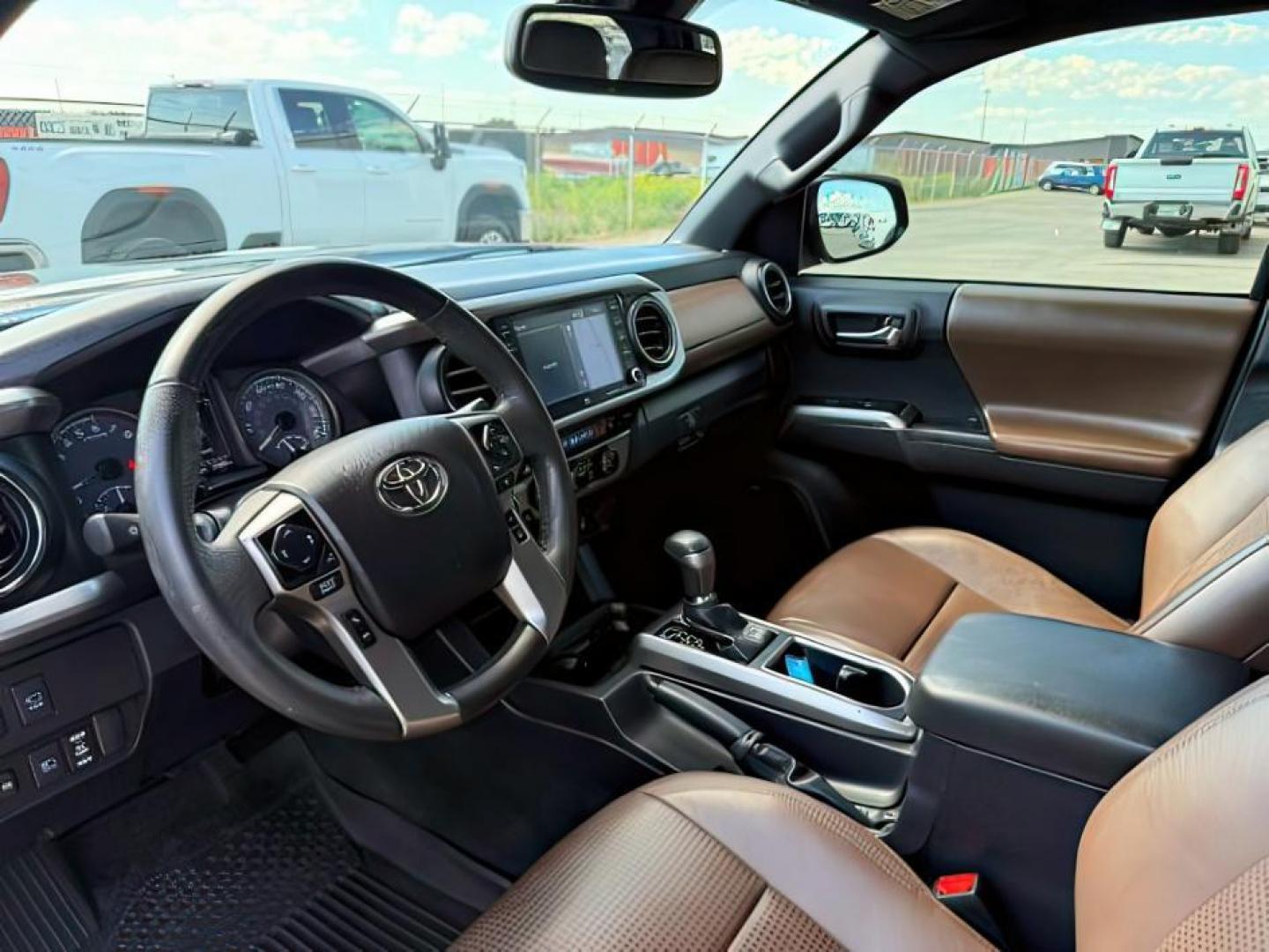 2022 Midnight Black Metallic /Black/Black Toyota Tacoma Limited (3TYGZ5AN0NT) with an 3.5L V-6 port/direct injection engine, AUTOMATIC transmission, located at 1235 N Woodruff Ave., Idaho Falls, 83401, (208) 523-1053, 43.507172, -112.000488 - At Timberline Auto, finding a great deal on your next vehicle is always easy! Our experienced sales staff's goal is to help find you the right vehicle at the right price! Our knowledgeable finance department has options for almost any credit score. We offer extended service contract options to prote - Photo#11
