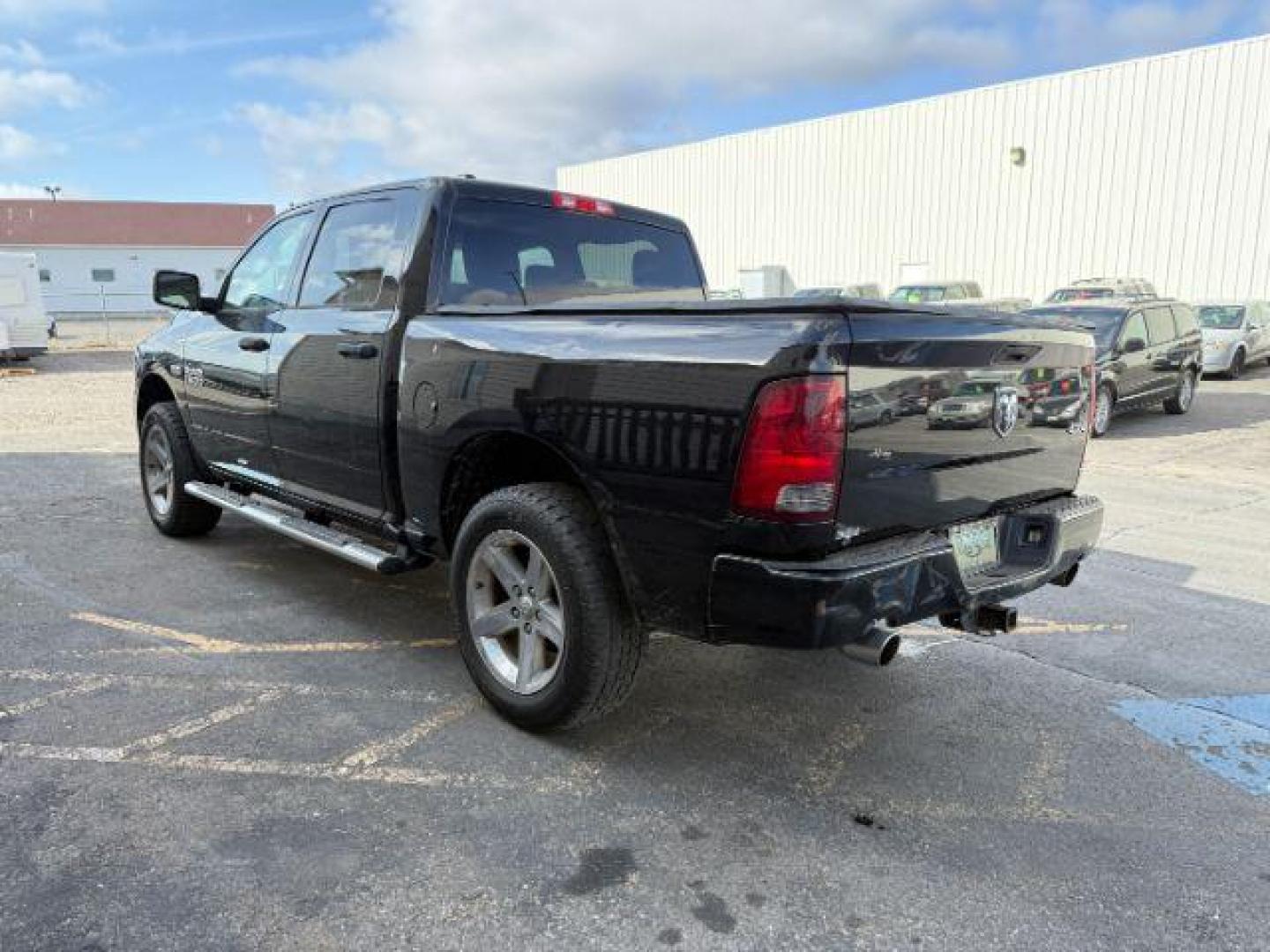 2014 Black Clearcoat /Diesel Gray/Black Ram 1500 Express (1C6RR7KT2ES) with an 3.6L V-6 DOHC engine, AUTOMATIC transmission, located at 1235 N Woodruff Ave., Idaho Falls, 83401, (208) 523-1053, 43.507172, -112.000488 - At Timberline Auto, finding a great deal on your next vehicle is always easy! Our experienced sales staff's goal is to help find you the right vehicle at the right price! Our knowledgeable finance department has options for almost any credit score. We offer extended service contract options to prote - Photo#1
