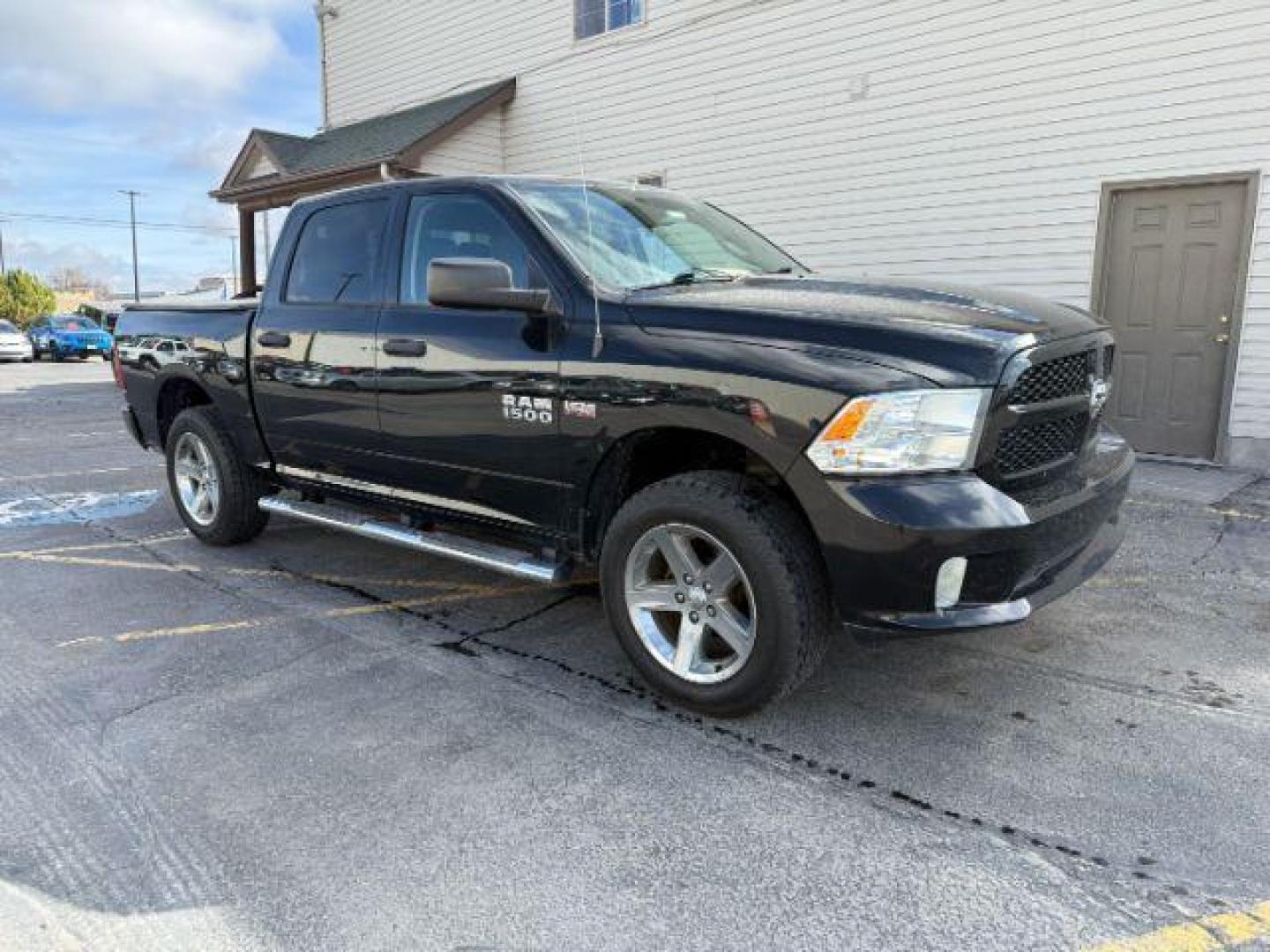 2014 Black Clearcoat /Diesel Gray/Black Ram 1500 Express (1C6RR7KT2ES) with an 3.6L V-6 DOHC engine, AUTOMATIC transmission, located at 1235 N Woodruff Ave., Idaho Falls, 83401, (208) 523-1053, 43.507172, -112.000488 - At Timberline Auto, finding a great deal on your next vehicle is always easy! Our experienced sales staff's goal is to help find you the right vehicle at the right price! Our knowledgeable finance department has options for almost any credit score. We offer extended service contract options to prote - Photo#5