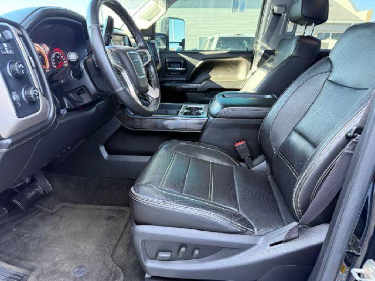 2015 Onyx Black /Jet Black GMC Sierra 2500HD Denali (1GT120E84FF) with an Duramax 6.6L V-8 diesel direct injection engine, AUTOMATIC transmission, located at 1235 N Woodruff Ave., Idaho Falls, 83401, (208) 523-1053, 43.507172, -112.000488 - At Timberline Auto, finding a great deal on your next vehicle is always easy! Our experienced sales staff's goal is to help find you the right vehicle at the right price! Our knowledgeable finance department has options for almost any credit score. We offer extended service contract options to prote - Photo#9