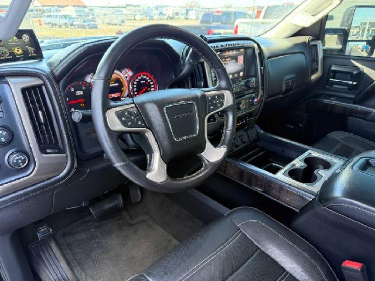 2015 Onyx Black /Jet Black GMC Sierra 2500HD Denali (1GT120E84FF) with an Duramax 6.6L V-8 diesel direct injection engine, AUTOMATIC transmission, located at 1235 N Woodruff Ave., Idaho Falls, 83401, (208) 523-1053, 43.507172, -112.000488 - At Timberline Auto, finding a great deal on your next vehicle is always easy! Our experienced sales staff's goal is to help find you the right vehicle at the right price! Our knowledgeable finance department has options for almost any credit score. We offer extended service contract options to prote - Photo#10
