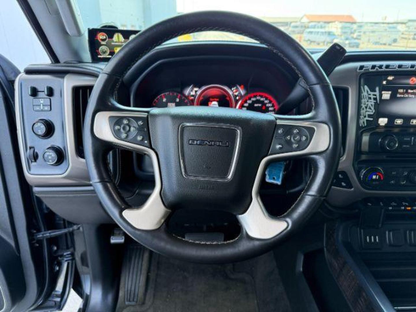 2015 Onyx Black /Jet Black GMC Sierra 2500HD Denali (1GT120E84FF) with an Duramax 6.6L V-8 diesel direct injection engine, AUTOMATIC transmission, located at 1235 N Woodruff Ave., Idaho Falls, 83401, (208) 523-1053, 43.507172, -112.000488 - At Timberline Auto, finding a great deal on your next vehicle is always easy! Our experienced sales staff's goal is to help find you the right vehicle at the right price! Our knowledgeable finance department has options for almost any credit score. We offer extended service contract options to prote - Photo#11