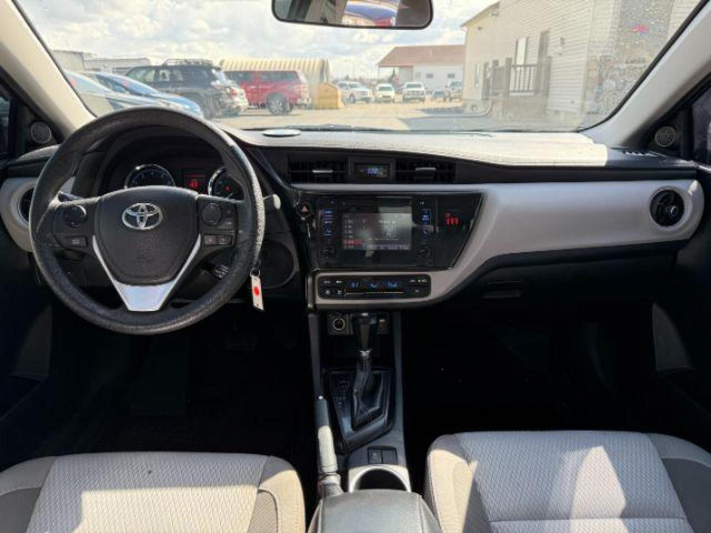 2018 BLACK /Steel Gray Toyota Corolla SE (2T1BURHE6JC) with an 1.8L I-4 DOHC engine, AUTOMATIC transmission, located at 1235 N Woodruff Ave., Idaho Falls, 83401, (208) 523-1053, 43.507172, -112.000488 - At Timberline Auto, finding a great deal on your next vehicle is always easy! Our experienced sales staff's goal is to help find you the right vehicle at the right price! Our knowledgeable finance department has options for almost any credit score. We offer extended service contract options to prote - Photo#14