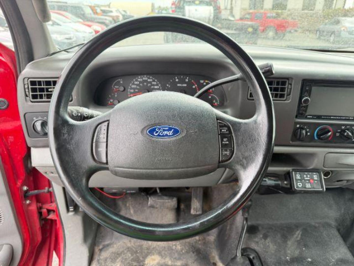 2003 Red Clearcoat /Medium Flint Ford F-350 XLT (1FTWX33F73E) with an Powerstroke 6L V-8 diesel direct injection engine, AUTOMATIC transmission, located at 1235 N Woodruff Ave., Idaho Falls, 83401, (208) 523-1053, 43.507172, -112.000488 - At Timberline Auto, finding a great deal on your next vehicle is always easy! Our experienced sales staff's goal is to help find you the right vehicle at the right price! Our knowledgeable finance department has options for almost any credit score. We offer extended service contract options to prote - Photo#11