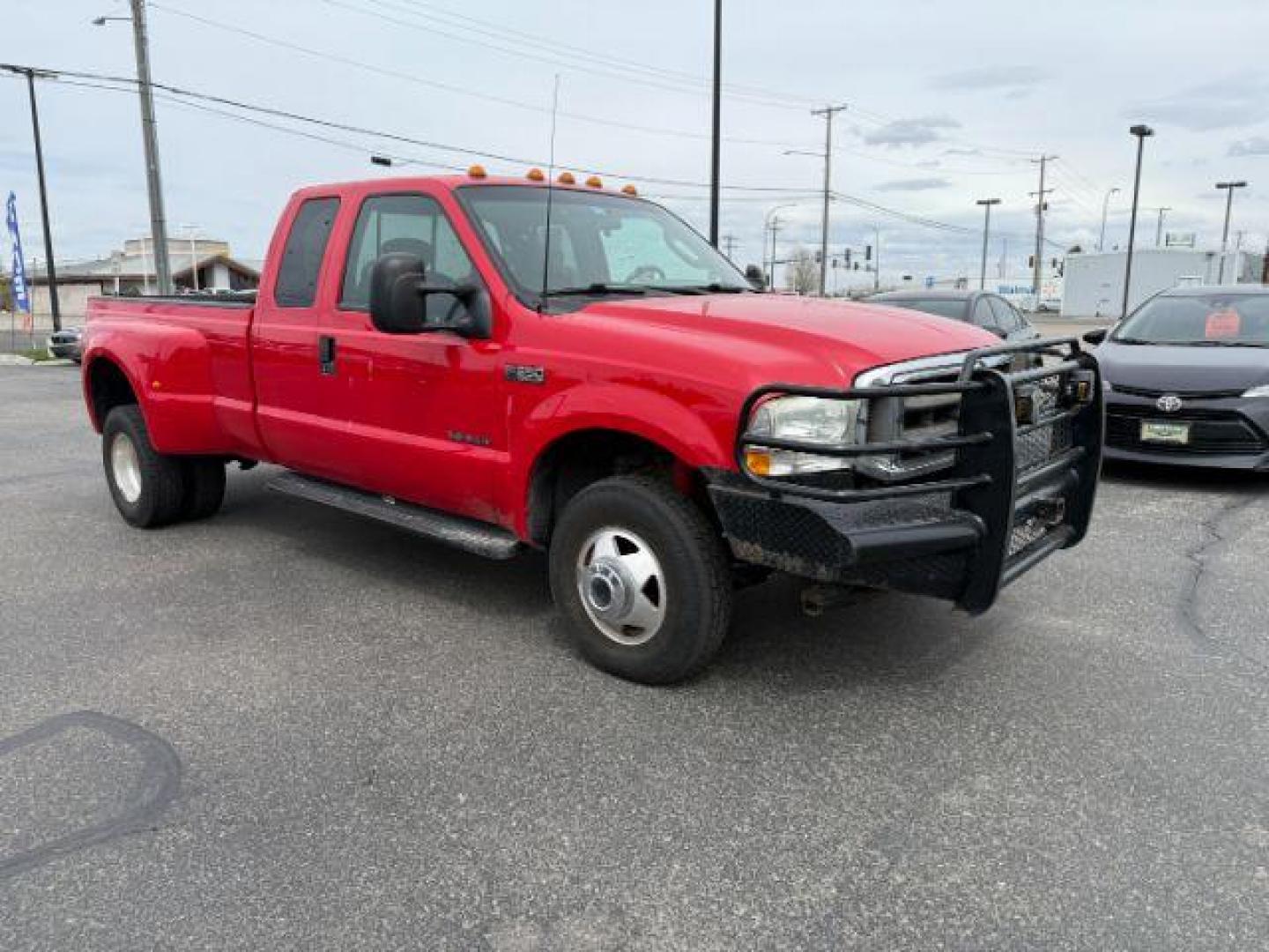 2003 Red Clearcoat /Medium Flint Ford F-350 XLT (1FTWX33F73E) with an Powerstroke 6L V-8 diesel direct injection engine, AUTOMATIC transmission, located at 1235 N Woodruff Ave., Idaho Falls, 83401, (208) 523-1053, 43.507172, -112.000488 - At Timberline Auto, finding a great deal on your next vehicle is always easy! Our experienced sales staff's goal is to help find you the right vehicle at the right price! Our knowledgeable finance department has options for almost any credit score. We offer extended service contract options to prote - Photo#6