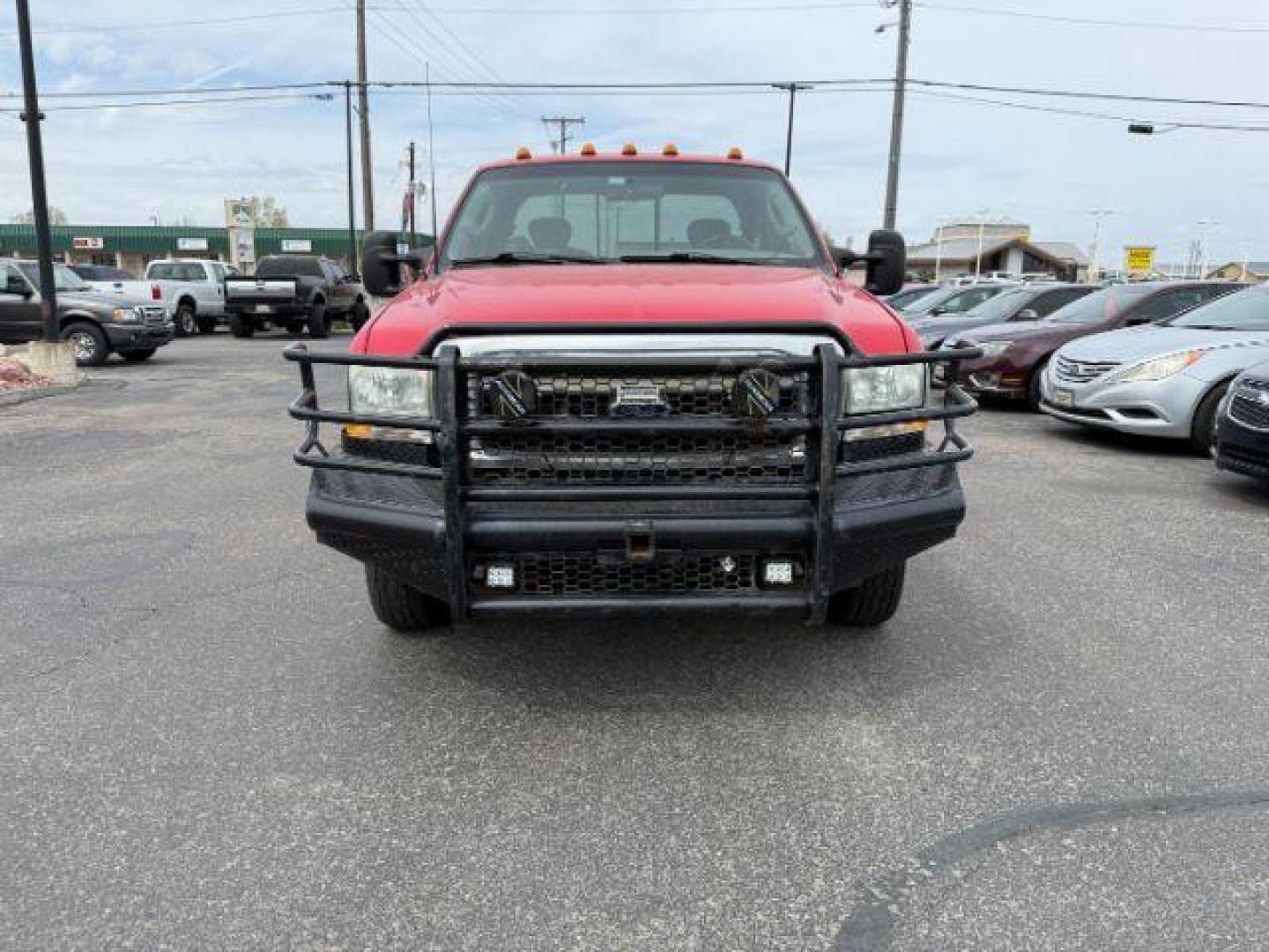 2003 Red Clearcoat /Medium Flint Ford F-350 XLT (1FTWX33F73E) with an Powerstroke 6L V-8 diesel direct injection engine, AUTOMATIC transmission, located at 1235 N Woodruff Ave., Idaho Falls, 83401, (208) 523-1053, 43.507172, -112.000488 - At Timberline Auto, finding a great deal on your next vehicle is always easy! Our experienced sales staff's goal is to help find you the right vehicle at the right price! Our knowledgeable finance department has options for almost any credit score. We offer extended service contract options to prote - Photo#7