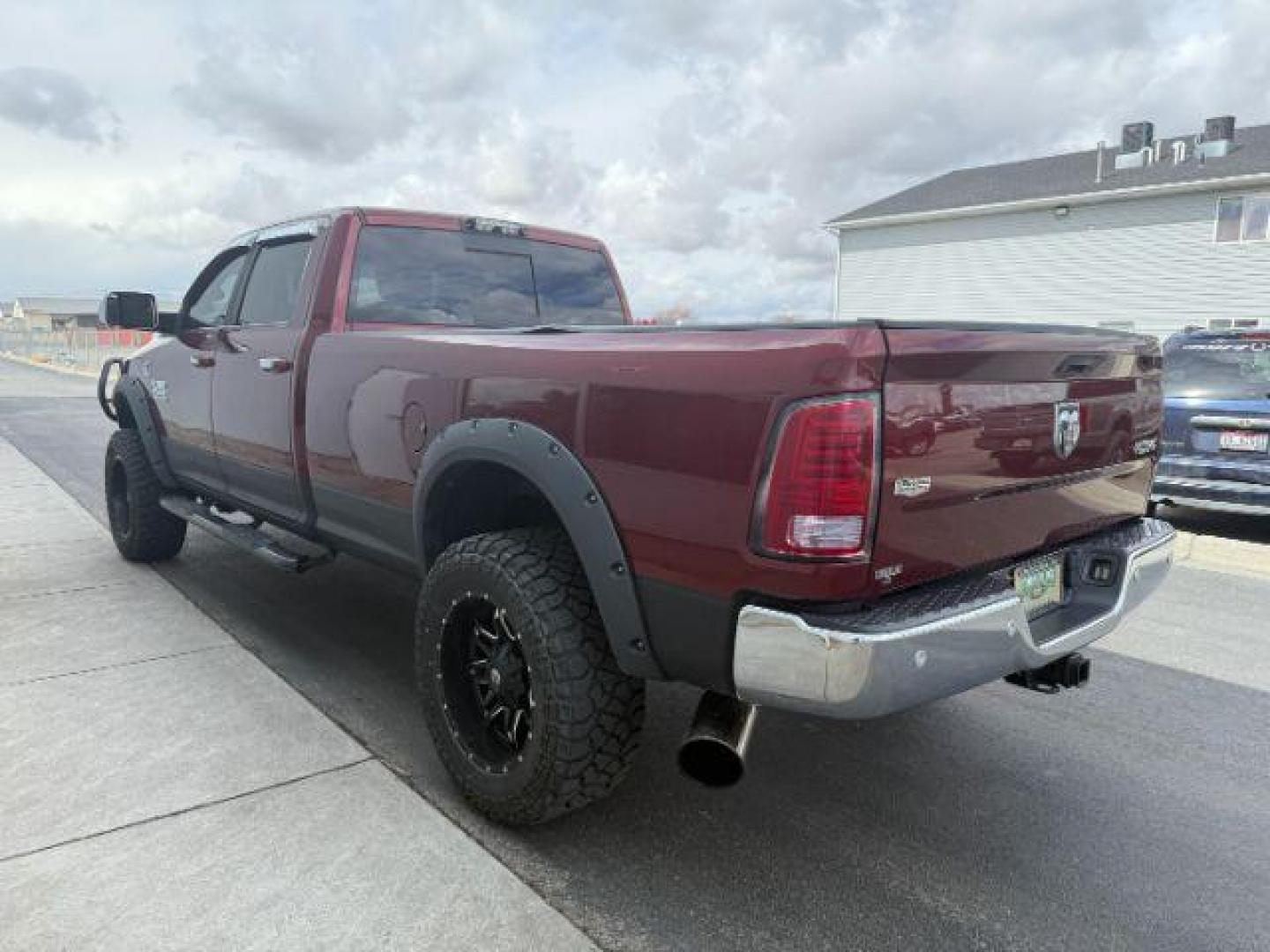 2017 RED /Black Ram 3500 Laramie Crew Cab 4x4 8' Box (3C63R3JL2HG) with an 6.7 engine, automatic transmission, located at 1235 N Woodruff Ave., Idaho Falls, 83401, (208) 523-1053, 43.507172, -112.000488 - At Timberline Auto, finding a great deal on your next vehicle is always easy! Our experienced sales staff's goal is to help find you the right vehicle at the right price! Our knowledgeable finance department has options for almost any credit score. We offer extended service contract options to prote - Photo#1