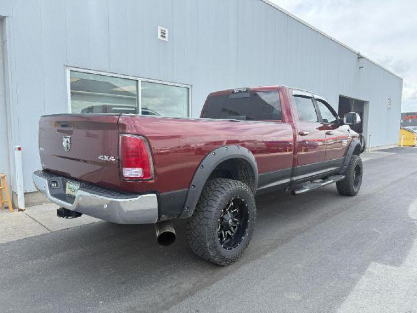 2017 RED /Black Ram 3500 Laramie Crew Cab 4x4 8' Box (3C63R3JL2HG) with an 6.7 engine, automatic transmission, located at 1235 N Woodruff Ave., Idaho Falls, 83401, (208) 523-1053, 43.507172, -112.000488 - At Timberline Auto, finding a great deal on your next vehicle is always easy! Our experienced sales staff's goal is to help find you the right vehicle at the right price! Our knowledgeable finance department has options for almost any credit score. We offer extended service contract options to prote - Photo#5