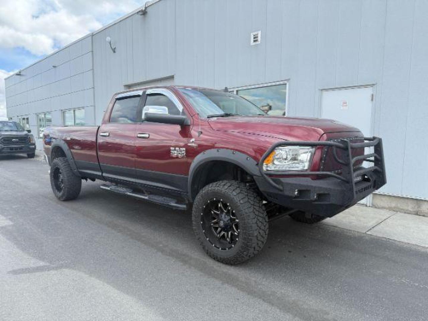 2017 RED /Black Ram 3500 Laramie Crew Cab 4x4 8' Box (3C63R3JL2HG) with an 6.7 engine, automatic transmission, located at 1235 N Woodruff Ave., Idaho Falls, 83401, (208) 523-1053, 43.507172, -112.000488 - At Timberline Auto, finding a great deal on your next vehicle is always easy! Our experienced sales staff's goal is to help find you the right vehicle at the right price! Our knowledgeable finance department has options for almost any credit score. We offer extended service contract options to prote - Photo#7