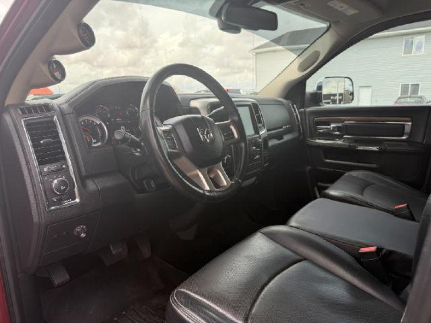 2017 RED /Black Ram 3500 Laramie Crew Cab 4x4 8' Box (3C63R3JL2HG) with an 6.7 engine, automatic transmission, located at 1235 N Woodruff Ave., Idaho Falls, 83401, (208) 523-1053, 43.507172, -112.000488 - At Timberline Auto, finding a great deal on your next vehicle is always easy! Our experienced sales staff's goal is to help find you the right vehicle at the right price! Our knowledgeable finance department has options for almost any credit score. We offer extended service contract options to prote - Photo#11