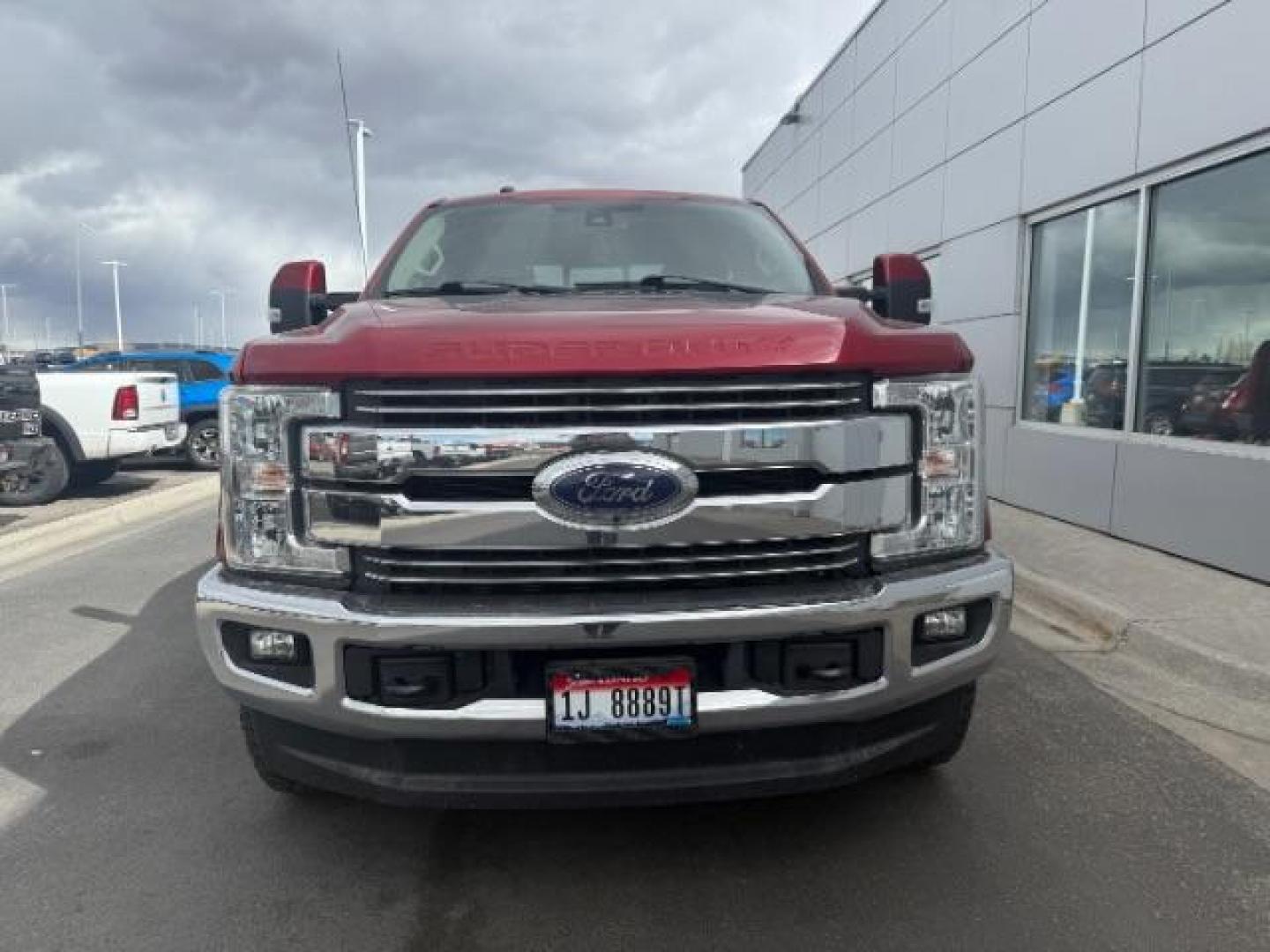 2017 Ruby Red Metallic Tinted Clearcoat /Black Ford F-350 LARIAT (1FT8W3BT6HE) with an 6.7 engine, AUTOMATIC transmission, located at 1235 N Woodruff Ave., Idaho Falls, 83401, (208) 523-1053, 43.507172, -112.000488 - At Timberline Auto, finding a great deal on your next vehicle is always easy! Our experienced sales staff's goal is to help find you the right vehicle at the right price! Our knowledgeable finance department has options for almost any credit score. We offer extended service contract options to prote - Photo#1