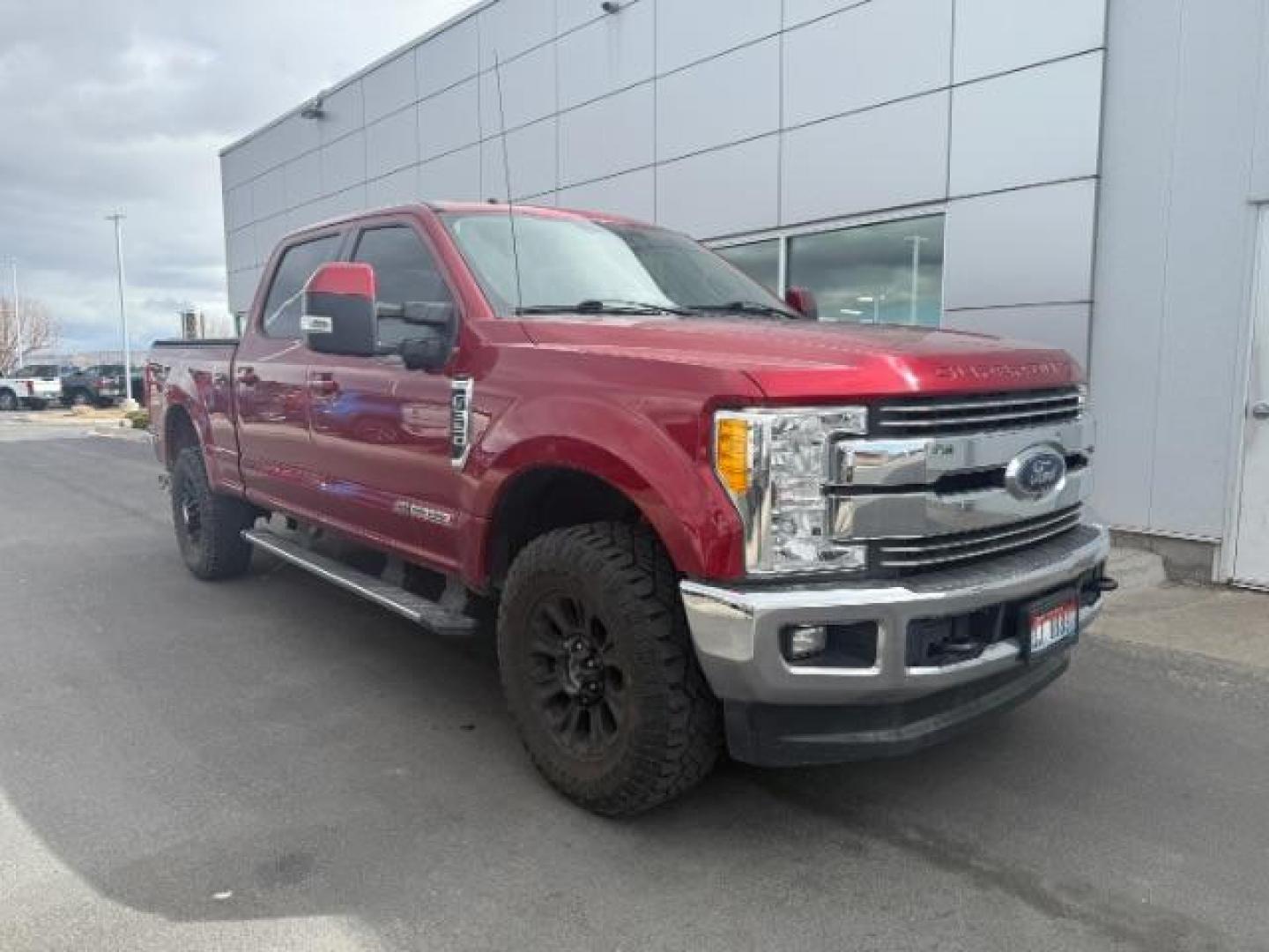 2017 Ruby Red Metallic Tinted Clearcoat /Black Ford F-350 LARIAT (1FT8W3BT6HE) with an 6.7 engine, AUTOMATIC transmission, located at 1235 N Woodruff Ave., Idaho Falls, 83401, (208) 523-1053, 43.507172, -112.000488 - At Timberline Auto, finding a great deal on your next vehicle is always easy! Our experienced sales staff's goal is to help find you the right vehicle at the right price! Our knowledgeable finance department has options for almost any credit score. We offer extended service contract options to prote - Photo#2