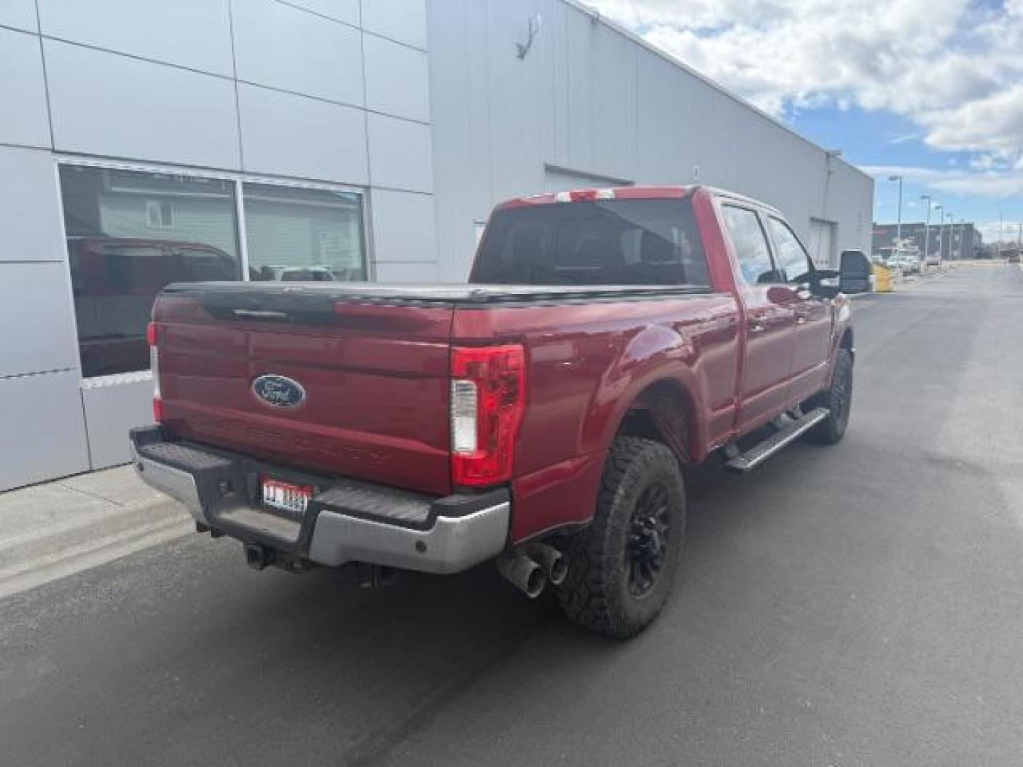 2017 Ruby Red Metallic Tinted Clearcoat /Black Ford F-350 LARIAT (1FT8W3BT6HE) with an 6.7 engine, AUTOMATIC transmission, located at 1235 N Woodruff Ave., Idaho Falls, 83401, (208) 523-1053, 43.507172, -112.000488 - At Timberline Auto, finding a great deal on your next vehicle is always easy! Our experienced sales staff's goal is to help find you the right vehicle at the right price! Our knowledgeable finance department has options for almost any credit score. We offer extended service contract options to prote - Photo#4