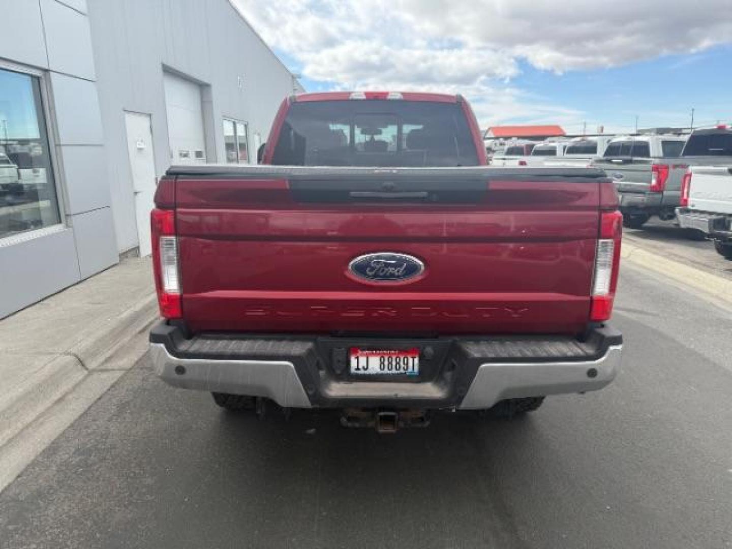 2017 Ruby Red Metallic Tinted Clearcoat /Black Ford F-350 LARIAT (1FT8W3BT6HE) with an 6.7 engine, AUTOMATIC transmission, located at 1235 N Woodruff Ave., Idaho Falls, 83401, (208) 523-1053, 43.507172, -112.000488 - At Timberline Auto, finding a great deal on your next vehicle is always easy! Our experienced sales staff's goal is to help find you the right vehicle at the right price! Our knowledgeable finance department has options for almost any credit score. We offer extended service contract options to prote - Photo#5