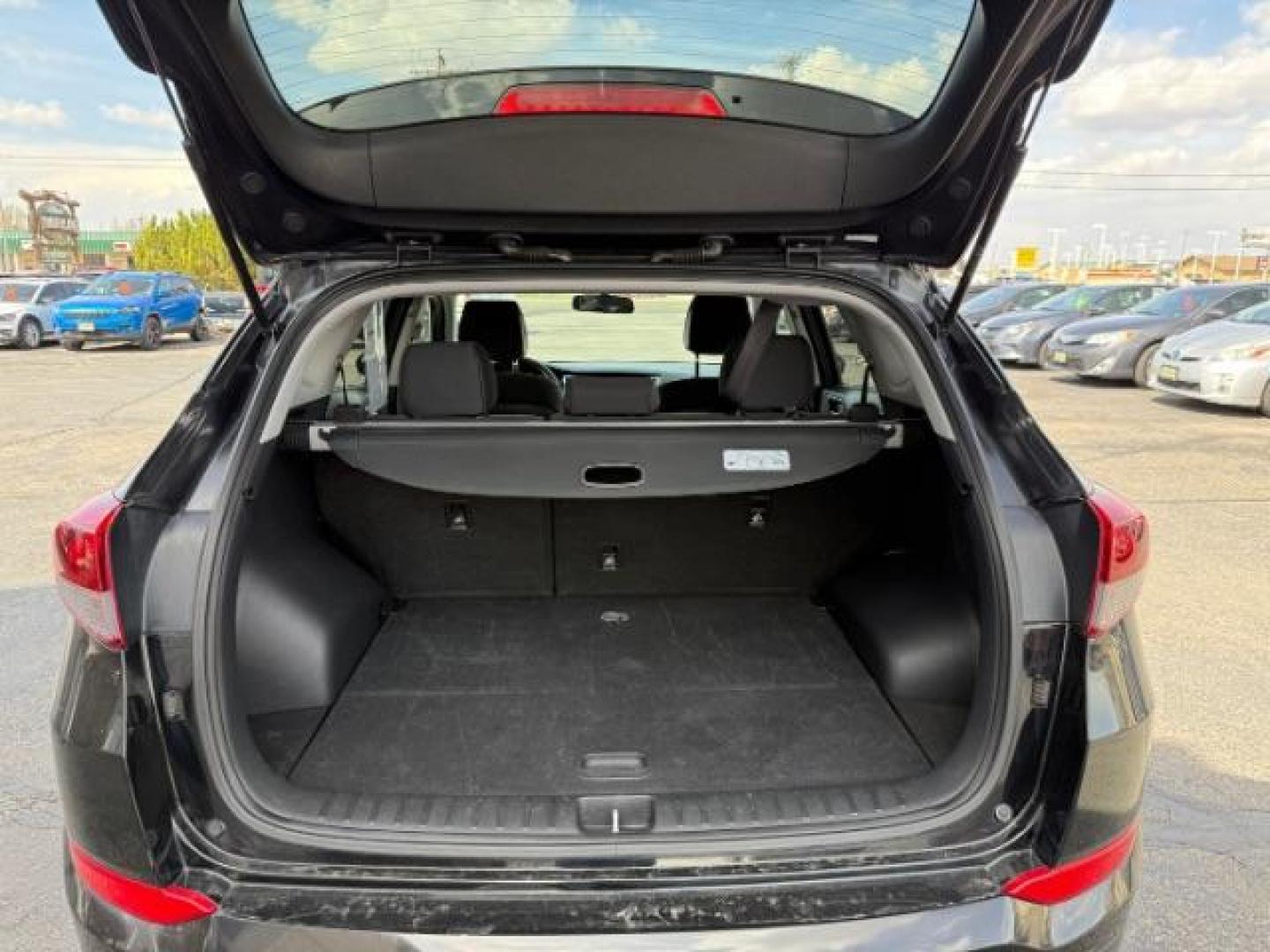 2017 Black Noir Pearl /Gray Hyundai Tucson SE (KM8J33A42HU) with an Nu 2L I-4 gasoline direct injection engine, AUTOMATIC transmission, located at 1235 N Woodruff Ave., Idaho Falls, 83401, (208) 523-1053, 43.507172, -112.000488 - At Timberline Auto, finding a great deal on your next vehicle is always easy! Our experienced sales staff's goal is to help find you the right vehicle at the right price! Our knowledgeable finance department has options for almost any credit score. We offer extended service contract options to prote - Photo#9