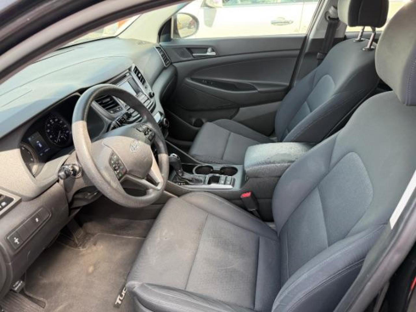 2017 Black Noir Pearl /Gray Hyundai Tucson SE (KM8J33A42HU) with an Nu 2L I-4 gasoline direct injection engine, AUTOMATIC transmission, located at 1235 N Woodruff Ave., Idaho Falls, 83401, (208) 523-1053, 43.507172, -112.000488 - At Timberline Auto, finding a great deal on your next vehicle is always easy! Our experienced sales staff's goal is to help find you the right vehicle at the right price! Our knowledgeable finance department has options for almost any credit score. We offer extended service contract options to prote - Photo#10