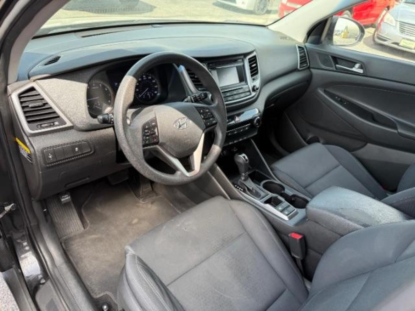 2017 Black Noir Pearl /Gray Hyundai Tucson SE (KM8J33A42HU) with an Nu 2L I-4 gasoline direct injection engine, AUTOMATIC transmission, located at 1235 N Woodruff Ave., Idaho Falls, 83401, (208) 523-1053, 43.507172, -112.000488 - At Timberline Auto, finding a great deal on your next vehicle is always easy! Our experienced sales staff's goal is to help find you the right vehicle at the right price! Our knowledgeable finance department has options for almost any credit score. We offer extended service contract options to prote - Photo#11