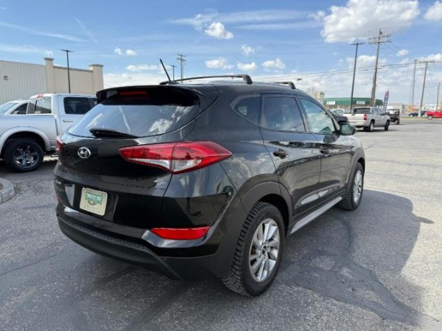 2017 Black Noir Pearl /Gray Hyundai Tucson SE (KM8J33A42HU) with an Nu 2L I-4 gasoline direct injection engine, AUTOMATIC transmission, located at 1235 N Woodruff Ave., Idaho Falls, 83401, (208) 523-1053, 43.507172, -112.000488 - At Timberline Auto, finding a great deal on your next vehicle is always easy! Our experienced sales staff's goal is to help find you the right vehicle at the right price! Our knowledgeable finance department has options for almost any credit score. We offer extended service contract options to prote - Photo#4
