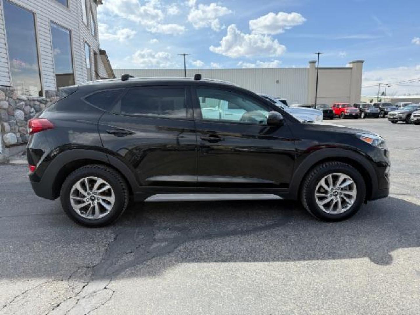 2017 Black Noir Pearl /Gray Hyundai Tucson SE (KM8J33A42HU) with an Nu 2L I-4 gasoline direct injection engine, AUTOMATIC transmission, located at 1235 N Woodruff Ave., Idaho Falls, 83401, (208) 523-1053, 43.507172, -112.000488 - At Timberline Auto, finding a great deal on your next vehicle is always easy! Our experienced sales staff's goal is to help find you the right vehicle at the right price! Our knowledgeable finance department has options for almost any credit score. We offer extended service contract options to prote - Photo#5