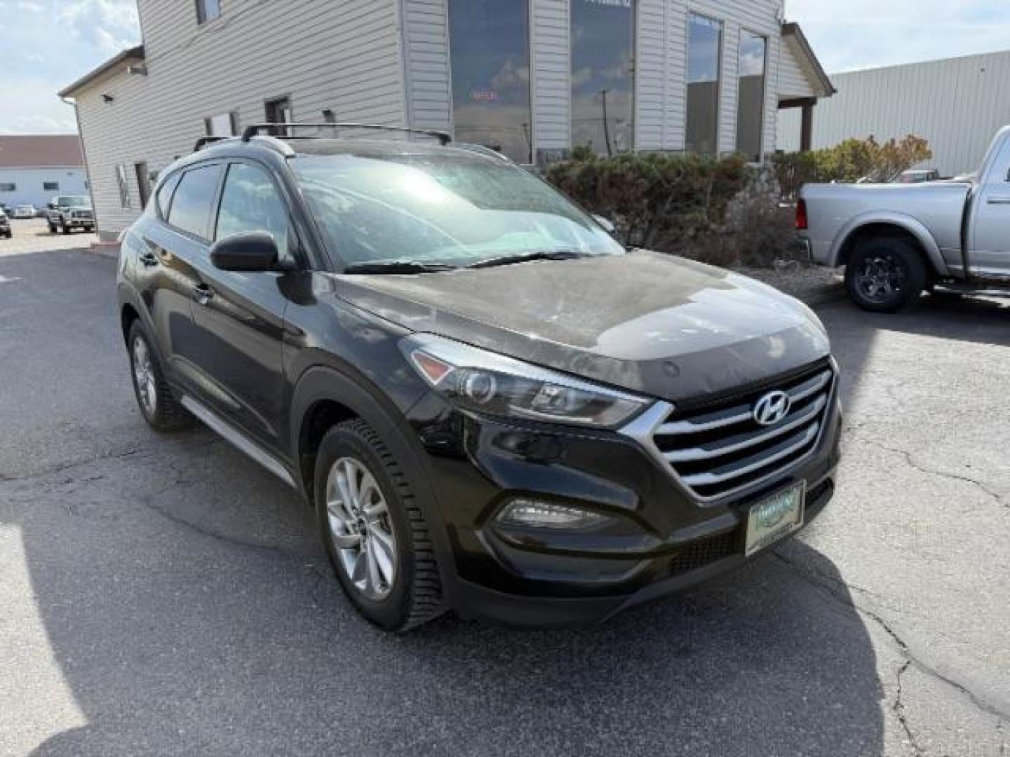 2017 Black Noir Pearl /Gray Hyundai Tucson SE (KM8J33A42HU) with an Nu 2L I-4 gasoline direct injection engine, AUTOMATIC transmission, located at 1235 N Woodruff Ave., Idaho Falls, 83401, (208) 523-1053, 43.507172, -112.000488 - At Timberline Auto, finding a great deal on your next vehicle is always easy! Our experienced sales staff's goal is to help find you the right vehicle at the right price! Our knowledgeable finance department has options for almost any credit score. We offer extended service contract options to prote - Photo#6