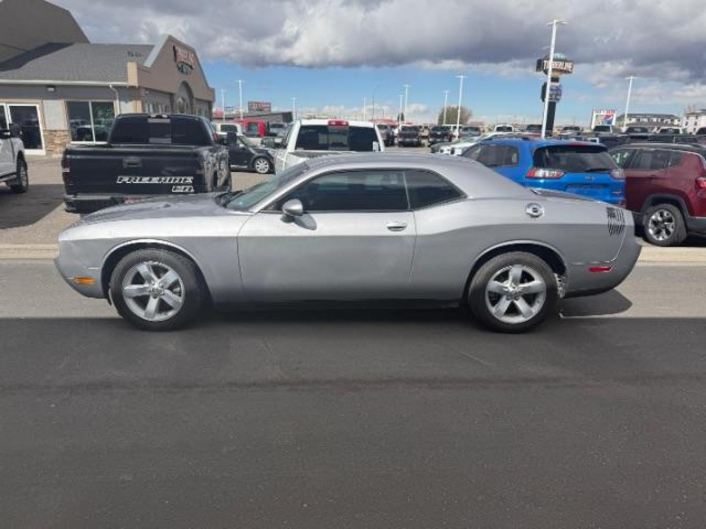 2014 Billet Silver Metallic CC /Dark Slate Gray Dodge Challenger SXT (2C3CDYAG7EH) with an 3.6L V6 DOHC 24V engine, 5-Speed Automatic transmission, located at 1235 N Woodruff Ave., Idaho Falls, 83401, (208) 523-1053, 43.507172, -112.000488 - At Timberline Auto, finding a great deal on your next vehicle is always easy! Our experienced sales staff's goal is to help find you the right vehicle at the right price! Our knowledgeable finance department has options for almost any credit score. We offer extended service contract options to prote - Photo#1