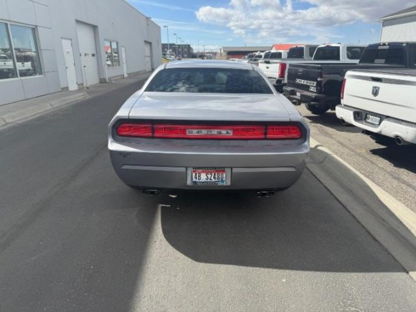 2014 Billet Silver Metallic CC /Dark Slate Gray Dodge Challenger SXT (2C3CDYAG7EH) with an 3.6L V6 DOHC 24V engine, 5-Speed Automatic transmission, located at 1235 N Woodruff Ave., Idaho Falls, 83401, (208) 523-1053, 43.507172, -112.000488 - At Timberline Auto, finding a great deal on your next vehicle is always easy! Our experienced sales staff's goal is to help find you the right vehicle at the right price! Our knowledgeable finance department has options for almost any credit score. We offer extended service contract options to prote - Photo#3