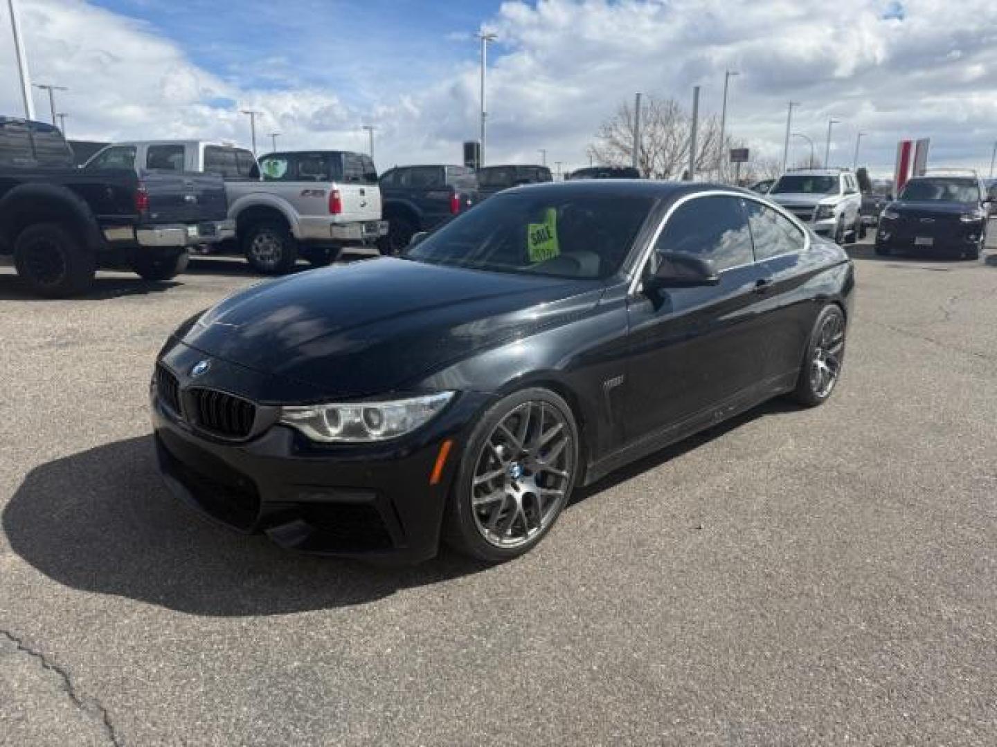 2015 Jet Black /Black w/Red Highlight BMW 435i xDrive (WBA3R5C5XFF) with an 3L I-6 gasoline direct injection engine, MANUAL transmission, located at 1235 N Woodruff Ave., Idaho Falls, 83401, (208) 523-1053, 43.507172, -112.000488 - At Timberline Auto, finding a great deal on your next vehicle is always easy! Our experienced sales staff's goal is to help find you the right vehicle at the right price! Our knowledgeable finance department has options for almost any credit score. We offer extended service contract options to prote - Photo#0