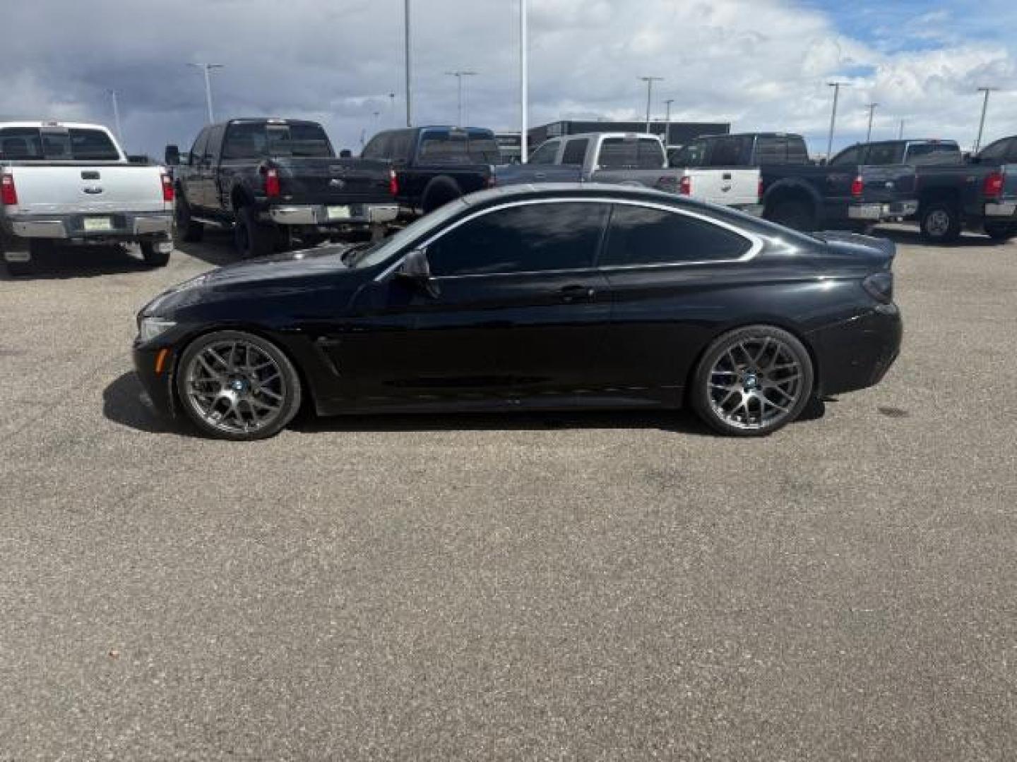 2015 Jet Black /Black w/Red Highlight BMW 435i xDrive (WBA3R5C5XFF) with an 3L I-6 gasoline direct injection engine, MANUAL transmission, located at 1235 N Woodruff Ave., Idaho Falls, 83401, (208) 523-1053, 43.507172, -112.000488 - At Timberline Auto, finding a great deal on your next vehicle is always easy! Our experienced sales staff's goal is to help find you the right vehicle at the right price! Our knowledgeable finance department has options for almost any credit score. We offer extended service contract options to prote - Photo#1