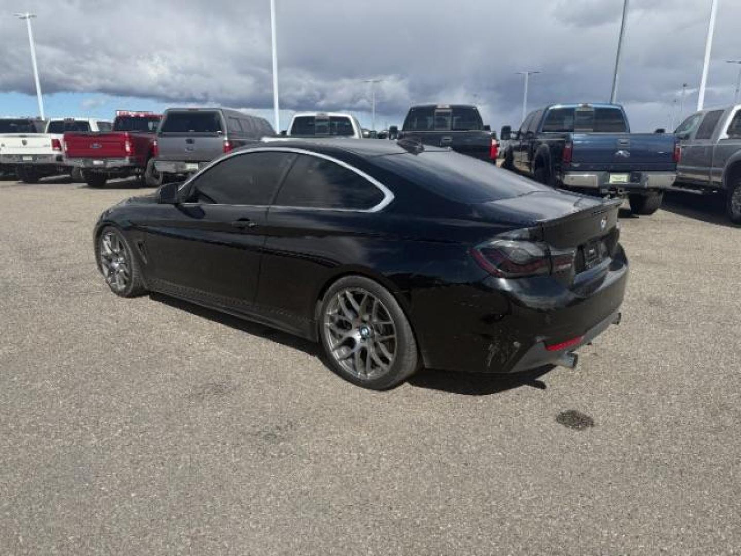 2015 Jet Black /Black w/Red Highlight BMW 435i xDrive (WBA3R5C5XFF) with an 3L I-6 gasoline direct injection engine, MANUAL transmission, located at 1235 N Woodruff Ave., Idaho Falls, 83401, (208) 523-1053, 43.507172, -112.000488 - At Timberline Auto, finding a great deal on your next vehicle is always easy! Our experienced sales staff's goal is to help find you the right vehicle at the right price! Our knowledgeable finance department has options for almost any credit score. We offer extended service contract options to prote - Photo#2