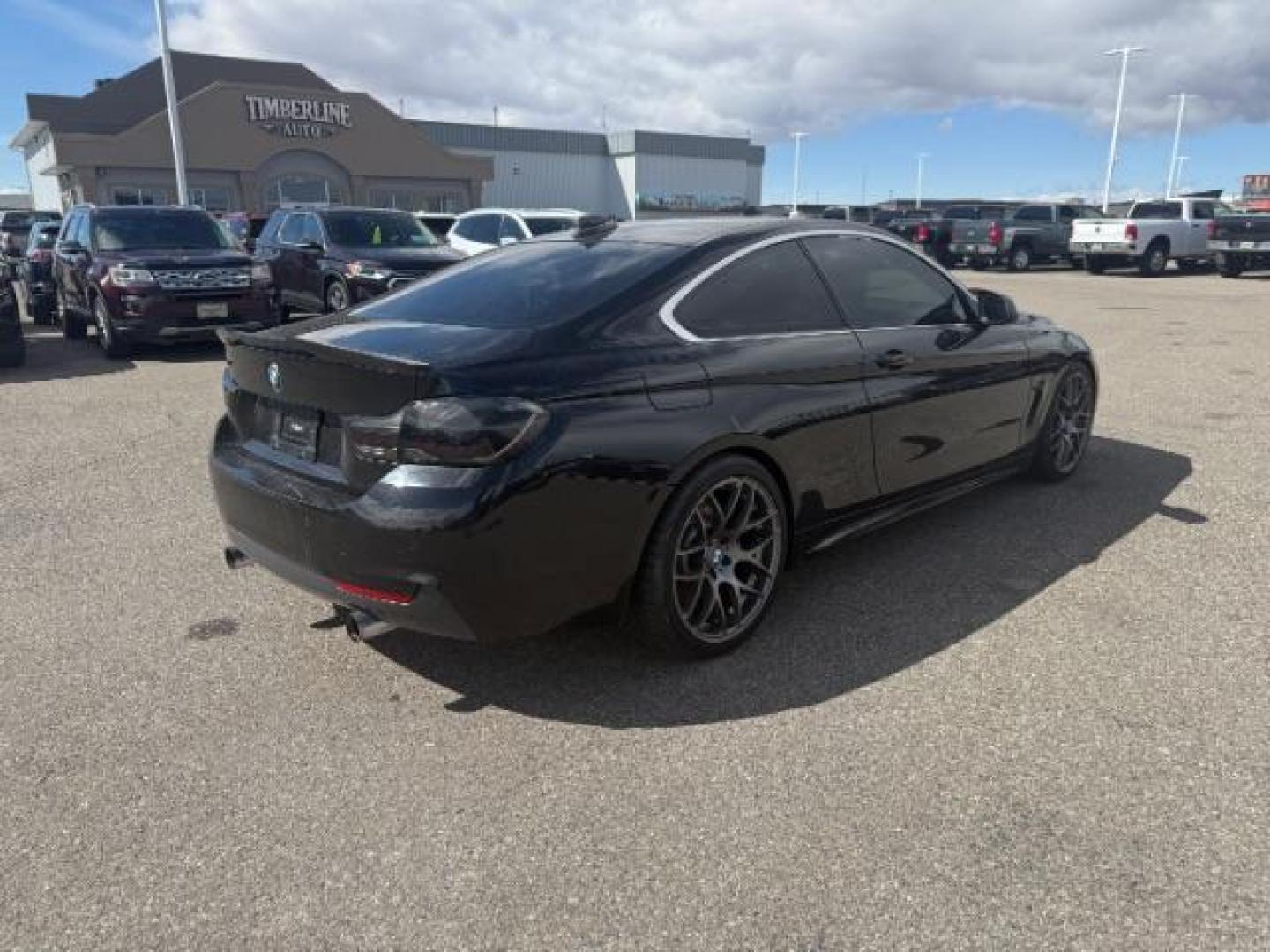 2015 Jet Black /Black w/Red Highlight BMW 435i xDrive (WBA3R5C5XFF) with an 3L I-6 gasoline direct injection engine, MANUAL transmission, located at 1235 N Woodruff Ave., Idaho Falls, 83401, (208) 523-1053, 43.507172, -112.000488 - At Timberline Auto, finding a great deal on your next vehicle is always easy! Our experienced sales staff's goal is to help find you the right vehicle at the right price! Our knowledgeable finance department has options for almost any credit score. We offer extended service contract options to prote - Photo#4