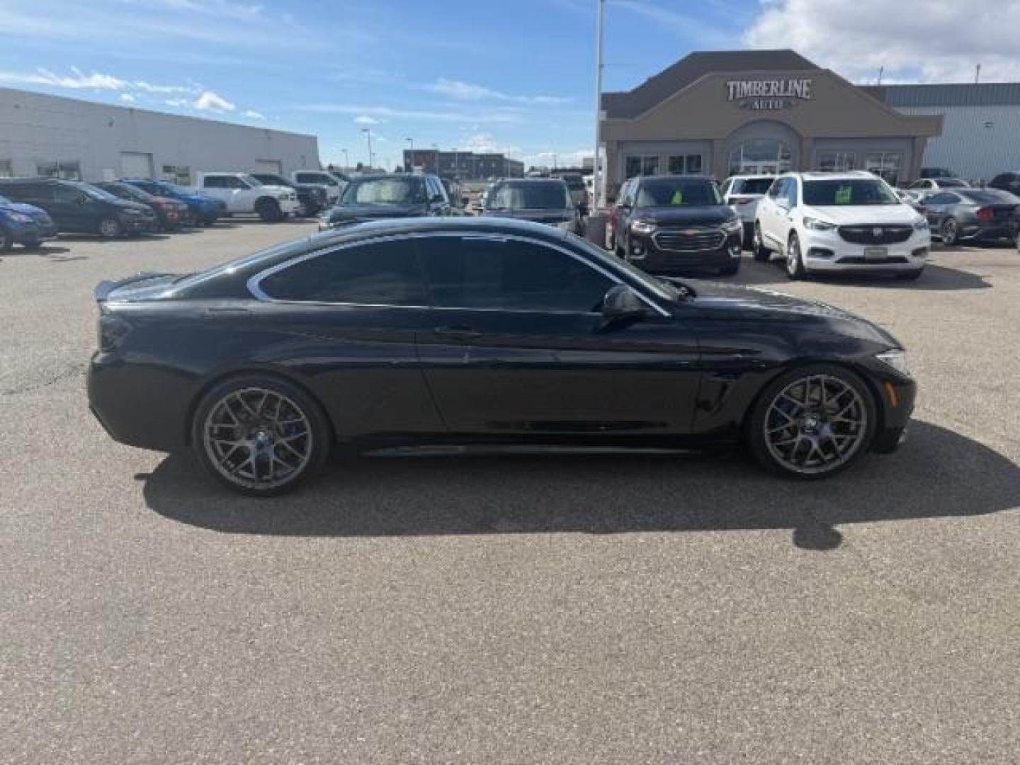 2015 Jet Black /Black w/Red Highlight BMW 435i xDrive (WBA3R5C5XFF) with an 3L I-6 gasoline direct injection engine, MANUAL transmission, located at 1235 N Woodruff Ave., Idaho Falls, 83401, (208) 523-1053, 43.507172, -112.000488 - At Timberline Auto, finding a great deal on your next vehicle is always easy! Our experienced sales staff's goal is to help find you the right vehicle at the right price! Our knowledgeable finance department has options for almost any credit score. We offer extended service contract options to prote - Photo#5