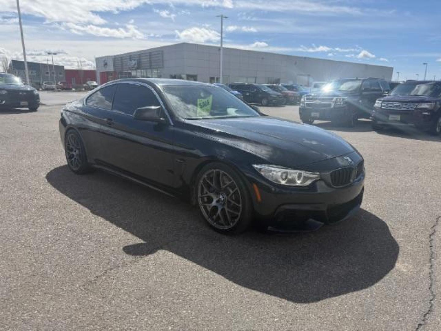 2015 Jet Black /Black w/Red Highlight BMW 435i xDrive (WBA3R5C5XFF) with an 3L I-6 gasoline direct injection engine, MANUAL transmission, located at 1235 N Woodruff Ave., Idaho Falls, 83401, (208) 523-1053, 43.507172, -112.000488 - At Timberline Auto, finding a great deal on your next vehicle is always easy! Our experienced sales staff's goal is to help find you the right vehicle at the right price! Our knowledgeable finance department has options for almost any credit score. We offer extended service contract options to prote - Photo#6
