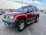 2013 Cayenne Red /Gray Nissan Xterra S (5N1AN0NW5DN) with an VQ 4L V-6 DOHC engine, AUTOMATIC transmission, located at 1235 N Woodruff Ave., Idaho Falls, 83401, (208) 523-1053, 43.507172, -112.000488 - At Timberline Auto, finding a great deal on your next vehicle is always easy! Our experienced sales staff's goal is to help find you the right vehicle at the right price! Our knowledgeable finance department has options for almost any credit score. We offer extended service contract options to prote - Photo#0