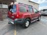 2013 Cayenne Red /Gray Nissan Xterra S (5N1AN0NW5DN) with an VQ 4L V-6 DOHC engine, AUTOMATIC transmission, located at 1235 N Woodruff Ave., Idaho Falls, 83401, (208) 523-1053, 43.507172, -112.000488 - At Timberline Auto, finding a great deal on your next vehicle is always easy! Our experienced sales staff's goal is to help find you the right vehicle at the right price! Our knowledgeable finance department has options for almost any credit score. We offer extended service contract options to prote - Photo#3