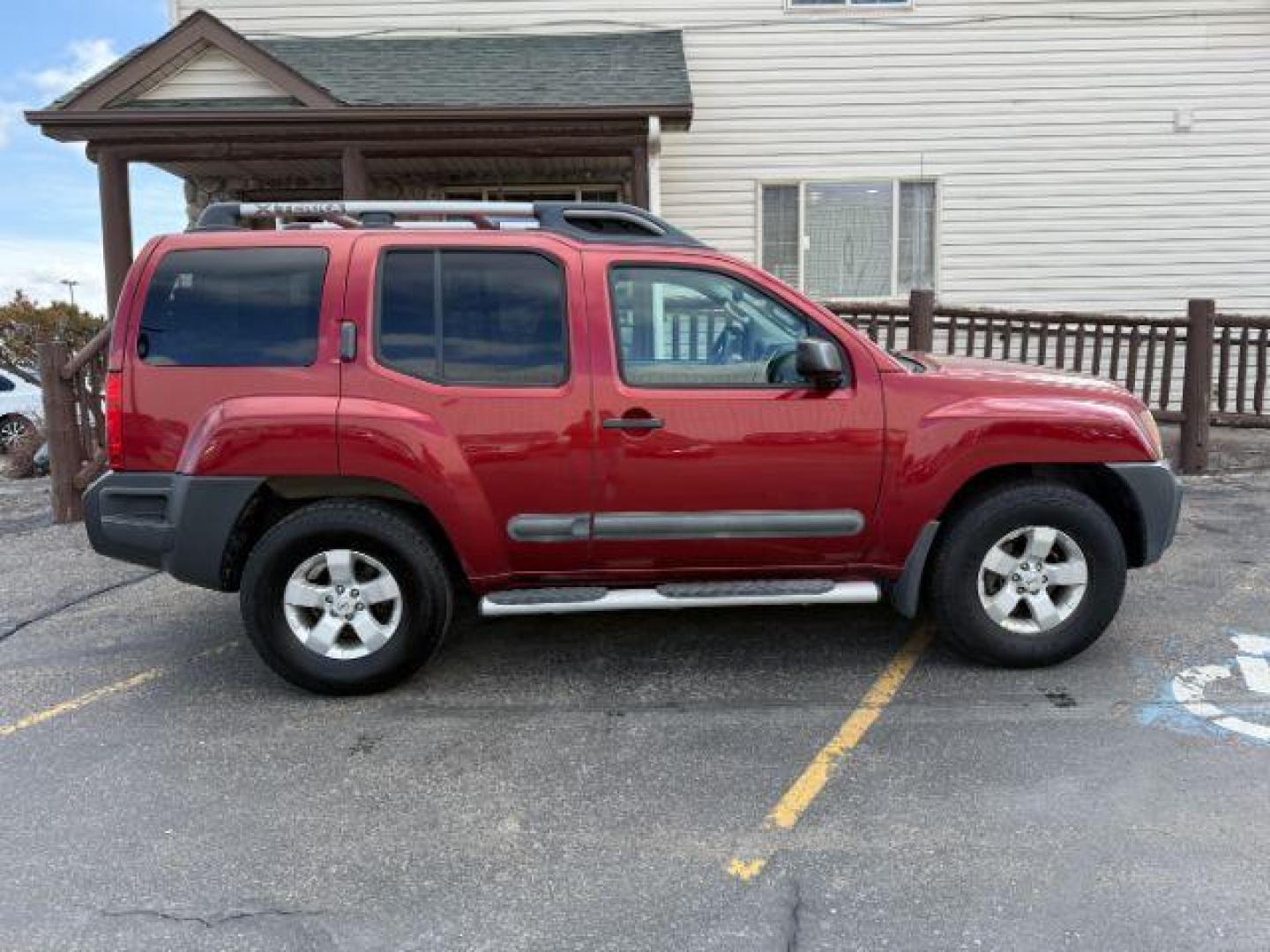 2013 Cayenne Red /Gray Nissan Xterra S (5N1AN0NW5DN) with an VQ 4L V-6 DOHC engine, AUTOMATIC transmission, located at 1235 N Woodruff Ave., Idaho Falls, 83401, (208) 523-1053, 43.507172, -112.000488 - At Timberline Auto, finding a great deal on your next vehicle is always easy! Our experienced sales staff's goal is to help find you the right vehicle at the right price! Our knowledgeable finance department has options for almost any credit score. We offer extended service contract options to prote - Photo#4