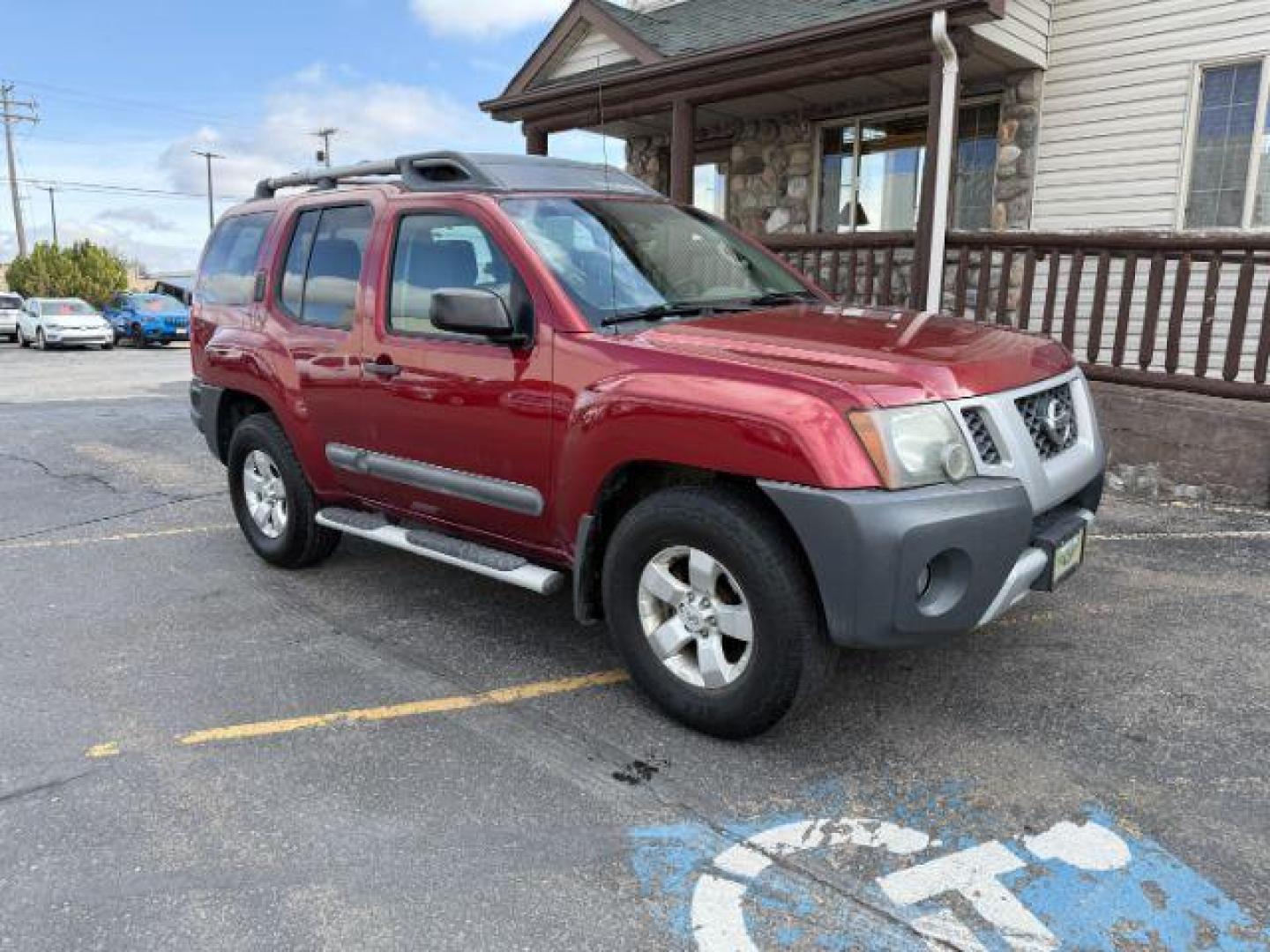 2013 Cayenne Red /Gray Nissan Xterra S (5N1AN0NW5DN) with an VQ 4L V-6 DOHC engine, AUTOMATIC transmission, located at 1235 N Woodruff Ave., Idaho Falls, 83401, (208) 523-1053, 43.507172, -112.000488 - At Timberline Auto, finding a great deal on your next vehicle is always easy! Our experienced sales staff's goal is to help find you the right vehicle at the right price! Our knowledgeable finance department has options for almost any credit score. We offer extended service contract options to prote - Photo#5