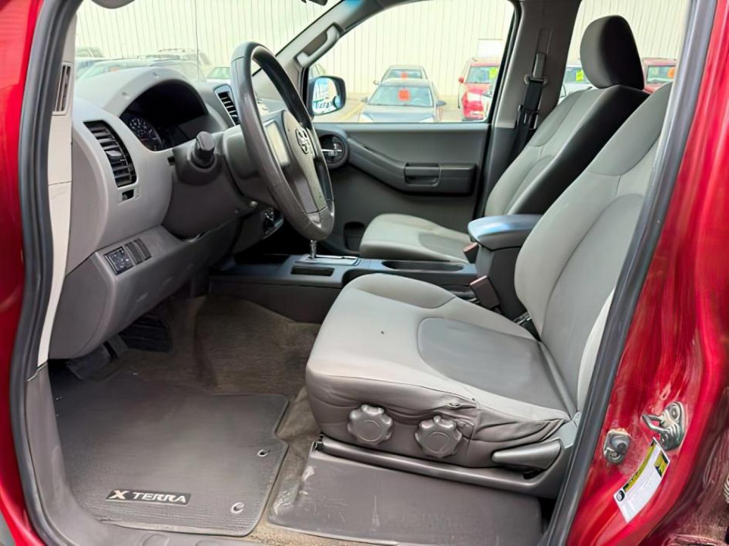 2013 Cayenne Red /Gray Nissan Xterra S (5N1AN0NW5DN) with an VQ 4L V-6 DOHC engine, AUTOMATIC transmission, located at 1235 N Woodruff Ave., Idaho Falls, 83401, (208) 523-1053, 43.507172, -112.000488 - At Timberline Auto, finding a great deal on your next vehicle is always easy! Our experienced sales staff's goal is to help find you the right vehicle at the right price! Our knowledgeable finance department has options for almost any credit score. We offer extended service contract options to prote - Photo#8