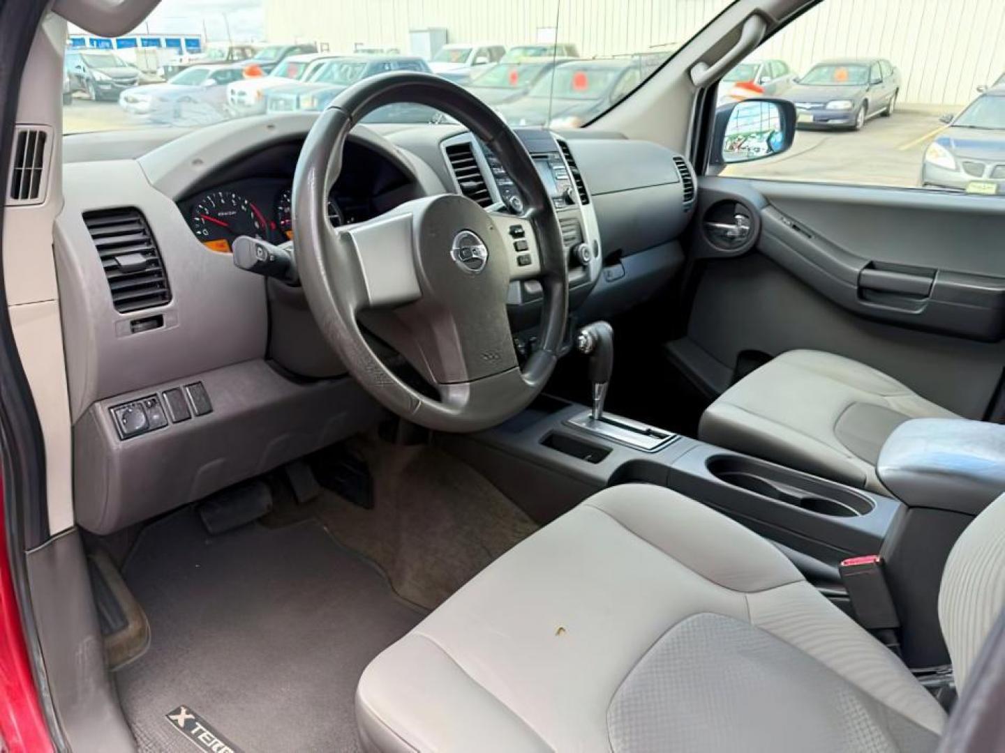 2013 Cayenne Red /Gray Nissan Xterra S (5N1AN0NW5DN) with an VQ 4L V-6 DOHC engine, AUTOMATIC transmission, located at 1235 N Woodruff Ave., Idaho Falls, 83401, (208) 523-1053, 43.507172, -112.000488 - At Timberline Auto, finding a great deal on your next vehicle is always easy! Our experienced sales staff's goal is to help find you the right vehicle at the right price! Our knowledgeable finance department has options for almost any credit score. We offer extended service contract options to prote - Photo#9