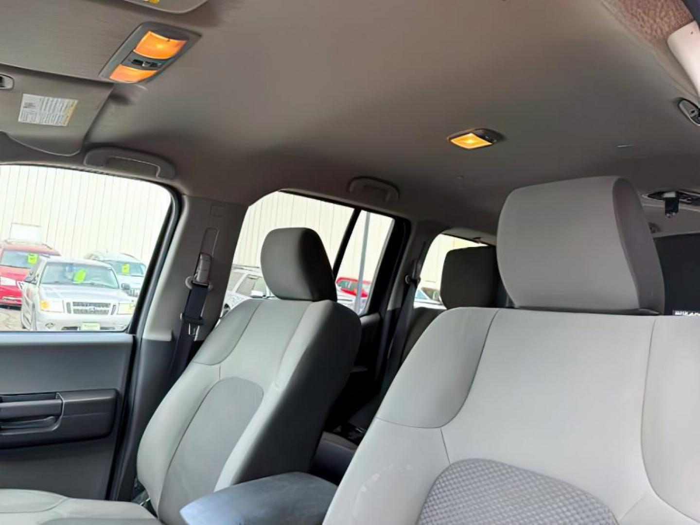 2013 Cayenne Red /Gray Nissan Xterra S (5N1AN0NW5DN) with an VQ 4L V-6 DOHC engine, AUTOMATIC transmission, located at 1235 N Woodruff Ave., Idaho Falls, 83401, (208) 523-1053, 43.507172, -112.000488 - At Timberline Auto, finding a great deal on your next vehicle is always easy! Our experienced sales staff's goal is to help find you the right vehicle at the right price! Our knowledgeable finance department has options for almost any credit score. We offer extended service contract options to prote - Photo#10