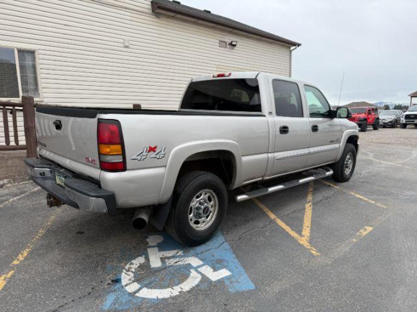 2005 Silver Birch Metallic /Dark Pewter GMC Sierra 2500HD SLT (1GTHK232X5F) with an Duramax 6.6L V-8 diesel direct injection engine, AUTOMATIC transmission, located at 1235 N Woodruff Ave., Idaho Falls, 83401, (208) 523-1053, 43.507172, -112.000488 - At Timberline Auto, finding a great deal on your next vehicle is always easy! Our experienced sales staff's goal is to help find you the right vehicle at the right price! Our knowledgeable finance department has options for almost any credit score. We offer extended service contract options to prote - Photo#3