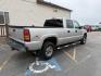 2005 Silver Birch Metallic /Dark Pewter GMC Sierra 2500HD SLT (1GTHK232X5F) with an Duramax 6.6L V-8 diesel direct injection engine, AUTOMATIC transmission, located at 1235 N Woodruff Ave., Idaho Falls, 83401, (208) 523-1053, 43.507172, -112.000488 - At Timberline Auto, finding a great deal on your next vehicle is always easy! Our experienced sales staff's goal is to help find you the right vehicle at the right price! Our knowledgeable finance department has options for almost any credit score. We offer extended service contract options to prote - Photo#3