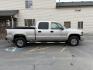 2005 Silver Birch Metallic /Dark Pewter GMC Sierra 2500HD SLT (1GTHK232X5F) with an Duramax 6.6L V-8 diesel direct injection engine, AUTOMATIC transmission, located at 1235 N Woodruff Ave., Idaho Falls, 83401, (208) 523-1053, 43.507172, -112.000488 - At Timberline Auto, finding a great deal on your next vehicle is always easy! Our experienced sales staff's goal is to help find you the right vehicle at the right price! Our knowledgeable finance department has options for almost any credit score. We offer extended service contract options to prote - Photo#4